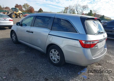 2012 Honda Odyssey Lx z USA, uszkodzony, nr VIN 5FNRL5H26CB011897
